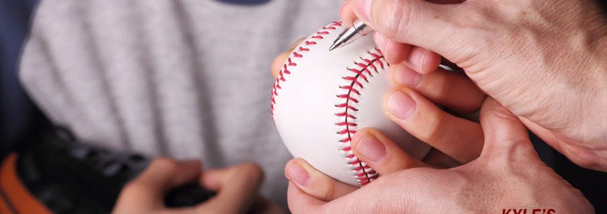 famous sport star signing a baseball - Kyle's Kollectibles fake autograph memorabilia