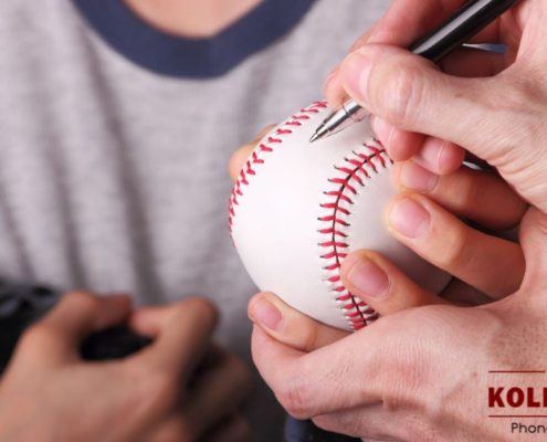 famous sport star signing a baseball - Kyle's Kollectibles fake autograph memorabilia