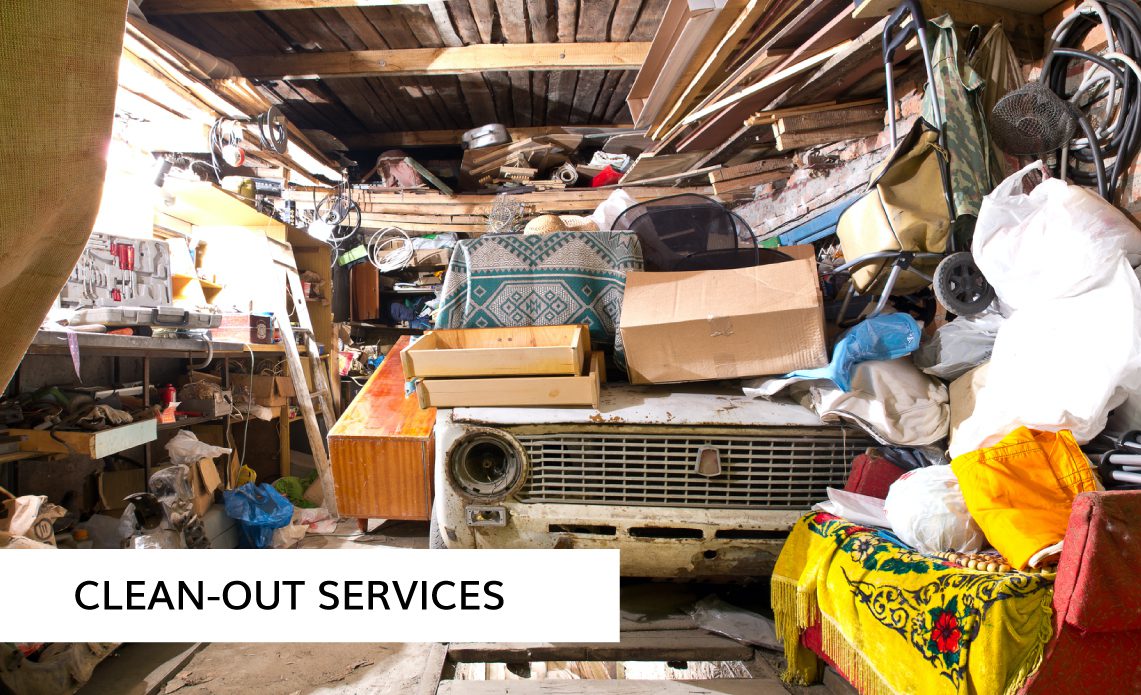 garage full of boxes and an old car - Kyle's Kollectibles