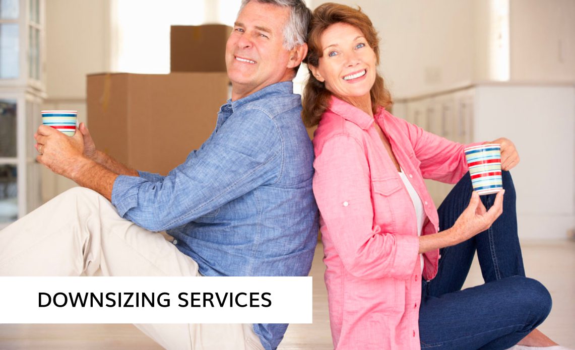 older man and woman sitting on carpet with cardboard boxes - Kyle's Kollectibles
