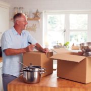 KylesKollectibles-house-clearing-and-liquidation-120420251 older man and woman packing up their kitchen - Kyle's Kollectibles house clearing & liquidation