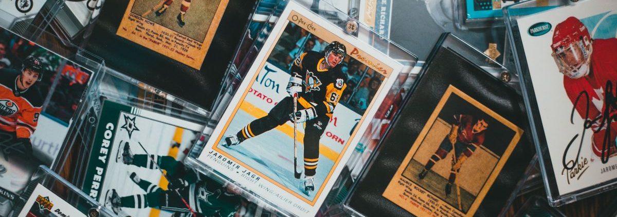 vintage sports cards laying on a table - Kyle's Kollectibles selling sports cards