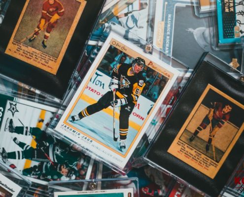 vintage sports cards laying on a table - Kyle's Kollectibles selling sports cards
